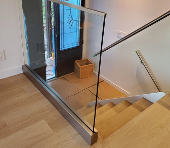 Elevate Your Space: Enhance Your Home or Business with Glass Railing